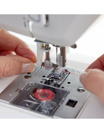 Enfileur intégré de la machine à coudre onyx 25 husqvarna-viking